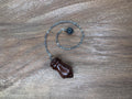 Walnut Pendulum with Larvikite